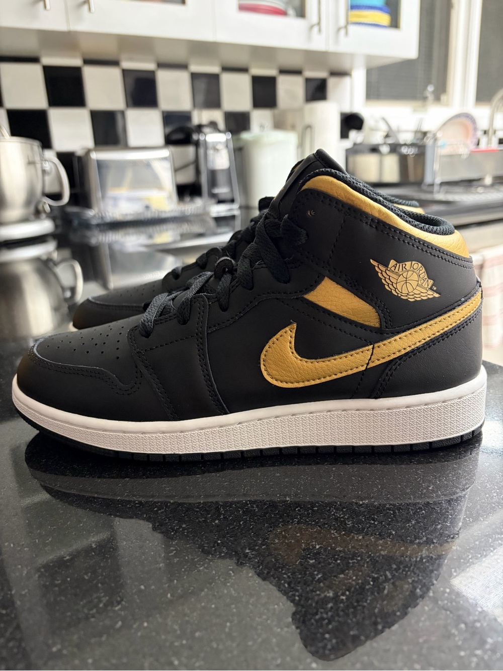 Jordan Kids Mid-Top Sneakers in Black and Gold Accent